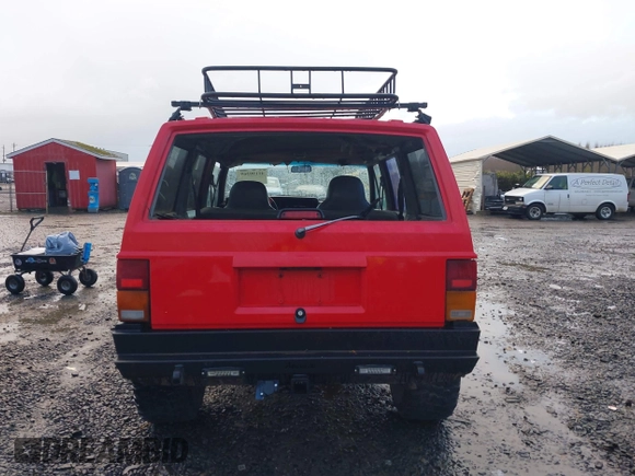 1996 Jeep Cherokee Sport with VIN 1J4FJ68S4TL244893, listed as a IAAI auction lot 41190369 with 192,459 mi miles and . Bid and sale history available at DreamBid. Image 17.