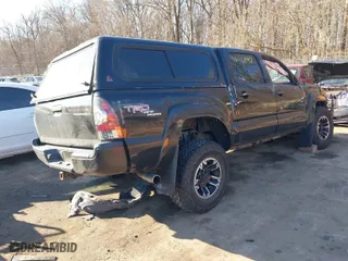 2011 Toyota Tacoma with VIN 3TMLU4EN4BM058738, listed as a IAAI auction lot 41646897 with 117,817 mi miles. Bid and sale history available at carsss.com. Image 4.