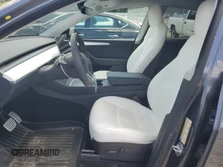 2022 Tesla Model Y Performance with VIN 7SAYGDEF3NF532311, listed as a Copart auction lot 62997535 with 60,530 mi miles and Salvage title. Bid and sale history available at DreamBid. Image 7.