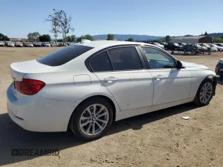 2018 BMW 3 Series 320i with VIN WBA8A9C5XJAH13799, listed as a Copart auction lot 53917375 with 104,635 mi miles and Salvage Title. Bid and sale history available at carsss.com. Image 3.