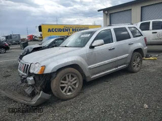 2010 Jeep Grand Cherokee Limited with VIN 1J4RR5GTXAC141033, listed as a Copart auction lot 50424185 with 131,356 mi miles and Salvage title. Bid and sale history available at DreamBid. Image 1.