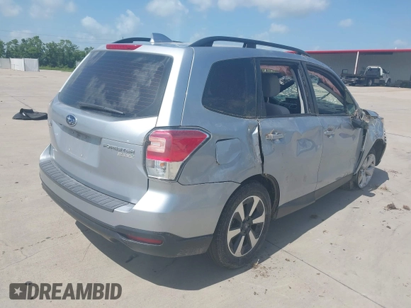 2017 Subaru Forester with VIN JF2SJABC5HH474561, listed as a IAAI auction lot 42532755 with 99,797 mi miles and . Bid and sale history available at DreamBid. Image 4.