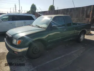 1999 Toyota Tacoma with VIN 4TAVL52N9XZ501635, listed as a Copart auction lot 63871125 with 212,254 mi miles and Salvage title. Bid and sale history available at DreamBid. Image 1.