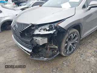 2020 Lexus RX 350 with VIN 2T2HZMAA7LC160132, listed as a IAAI auction lot 41935300 with 60,723 mi miles and . Bid and sale history available at DreamBid. Image 6.