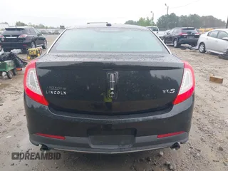 2014 Lincoln MKS z VIN 1LNHL9DK0EG610145, wystawiony jako IAAI lot #42348345 z przebiegiem 61 289 mil mil oraz . Historia ofert i sprzedaży dostępna na DreamBid. Obrazek 17.