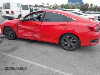 2019 Honda Civic Sport with VIN 2HGFC2F8XKH585650, listed as a IAAI auction lot 42043354 with 116,412 mi miles and . Bid and sale history available at DreamBid. Image 14.