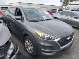 2019 Hyundai Tucson SE with VIN KM8J23A42KU079664, listed as a IAAI auction lot 41905729 with 14,624 mi miles. Bid and sale history available at carsss.com. Image 1.