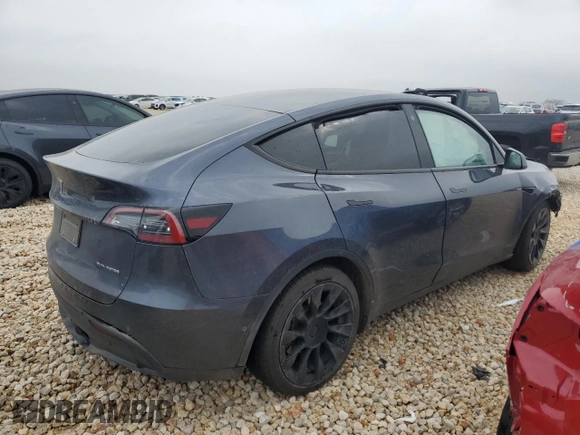 2022 Tesla Model Y Long Range z VIN 7SAYGAEE4NF543503, wystawiony jako Copart lot #47143155 z przebiegiem 53 874 mil mil oraz Szkody całkowita. Historia ofert i sprzedaży dostępna na DreamBid. Obrazek 3.