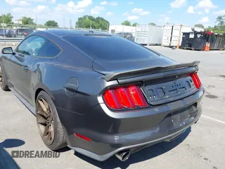 2015 Ford Mustang EcoBoost with VIN 1FA6P8TH8F5394953, listed as a IAAI auction lot 42618352 with 101,302 mi miles and . Bid and sale history available at DreamBid. Image 3.