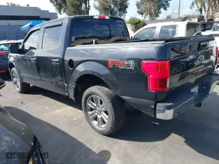 2018 Ford F-150 XL with VIN 1FTEW1E51JKC75896, listed as a IAAI auction lot 41681709 with 58,950 mi miles. Bid and sale history available at carsss.com. Image 3.