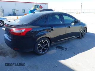 2014 Ford Focus SE with VIN 1FADP3F23EL355117, listed as a IAAI auction lot 41771824 with 211,052 mi miles. Bid and sale history available at carsss.com. Image 4.