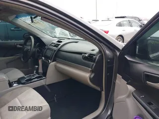 2014 Toyota Camry L z VIN 4T1BF1FK3EU322598, wystawiony jako IAAI lot #41490070 z przebiegiem 101 250 mil mil oraz . Historia ofert i sprzedaży dostępna na DreamBid. Obrazek 5.