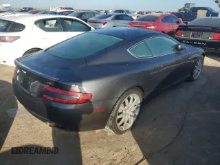 2005 Aston Martin DB9 z VIN SCFAD01A75GA02198, wystawiony jako Copart lot #75564554 z przebiegiem Nie podano mil oraz Nie do naprawy • Non repairable. Historia ofert i sprzedaży dostępna na DreamBid. Obrazek 3.
