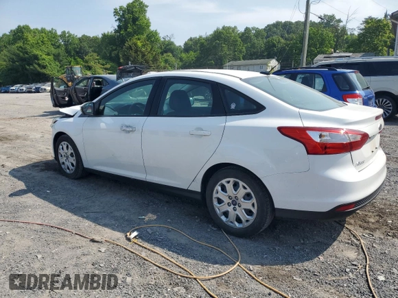 2012 Ford Focus SE with VIN 1FAHP3F21CL445400, listed as a Copart auction lot 58512535 with 142,515 mi miles and Salvage title. Bid and sale history available at DreamBid. Image 2.