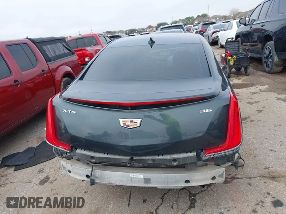 2018 Cadillac XTS Luxury with VIN 2G61M5S30J9164758, listed as a IAAI auction lot 41648265 with 173,134 mi miles and . Bid and sale history available at carsss.com. Image 17.