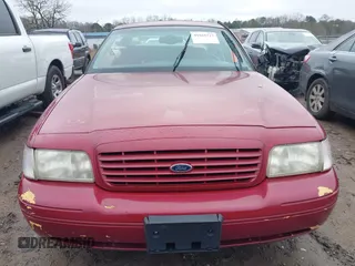 2002 Ford Crown Victoria LX z VIN 2FAFP74W82X148324, wystawiony jako IAAI lot #41565717 z przebiegiem 114 536 mil mil oraz . Historia ofert i sprzedaży dostępna na DreamBid. Obrazek 12.