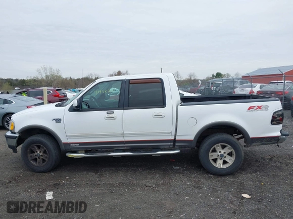 2003 Ford F-150 XLT with VIN 1FTRW08L43KA64328, listed as a IAAI auction lot 41932751 with 275,213 mi miles. Bid and sale history available at carsss.com. Image 14.