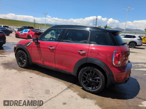 2015 MINI Countryman S with VIN WMWZC3C58FWT06695, listed as a Copart auction lot 56408325 with 99,673 mi miles and Salvage title. Bid and sale history available at DreamBid. Image 2.