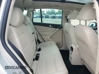 2013 Volkswagen Tiguan SE z VIN WVGBV7AX0DW539618, wystawiony jako Copart lot #71529804 z przebiegiem 148 362 mil mil oraz Szkoda całkowita • Salvage title. Historia ofert i sprzedaży dostępna na DreamBid. Obrazek 11.