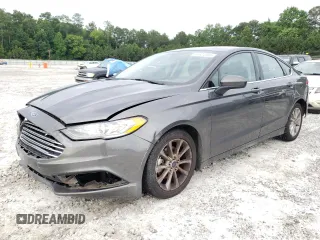 2017 Ford Fusion SE z VIN 3FA6P0H72HR369693, wystawiony jako Copart lot #61024105 z przebiegiem 253 353 mil mil oraz Czysty tytuł • Clean title. Historia ofert i sprzedaży dostępna na DreamBid. Obrazek 1.
