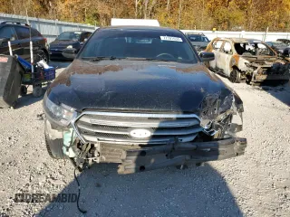 2015 Ford Taurus SEL z VIN 1FAHP2E85FG151155, wystawiony jako Copart lot #77791634 z przebiegiem 224 144 mil mil oraz Szkody całkowita. Historia ofert i sprzedaży dostępna na DreamBid. Obrazek 5.