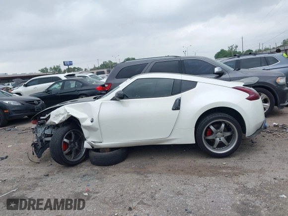 2016 Nissan 370Z Sport z VIN JN1AZ4EH1GM930883, wystawiony jako IAAI lot #41909945 z przebiegiem 80 484 mil mil oraz . Historia ofert i sprzedaży dostępna na DreamBid. Obrazek 15.