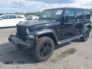 2023 Jeep Wrangler Willys with VIN 1C4HJXDN1PW634763, listed as a IAAI auction lot 41689202 with 23,369 mi miles and . Bid and sale history available at DreamBid. Image 2.