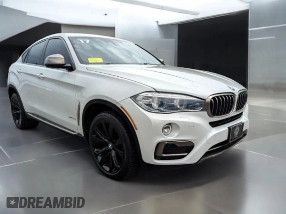 2017 BMW X6 xDrive35i z VIN 5UXKU2C38H0U30XXX, wystawiony jako Copart lot #60346505 z przebiegiem 70 591 mil mil oraz Czysty tytuł • Clean title. Historia ofert i sprzedaży dostępna na DreamBid. Obrazek 1.