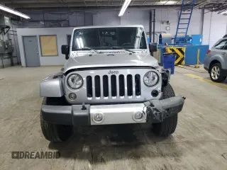 2015 Jeep Wrangler Unlimited Sahara with VIN 1C4BJWEG5FL743663, listed as a Copart auction lot 60205225 with 69,922 mi miles and Salvage title. Bid and sale history available at DreamBid. Image 5.