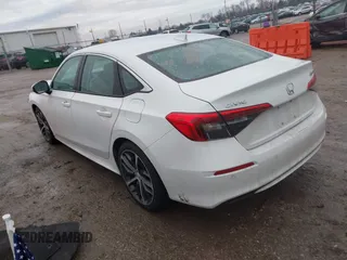 2023 Honda Civic Touring z VIN 2HGFE1F93PH304731, wystawiony jako IAAI lot #41675935 z przebiegiem 27 435 mil mil oraz . Historia ofert i sprzedaży dostępna na DreamBid. Obrazek 3.