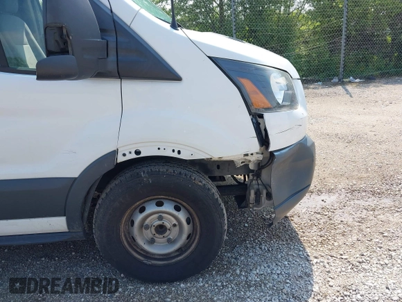 2015 Ford Transit Cargo z VIN 1FTNE1ZM4FKB15801, wystawiony jako IAAI lot #42674219 z przebiegiem 228 634 mil mil oraz . Historia ofert i sprzedaży dostępna na DreamBid. Obrazek 17.