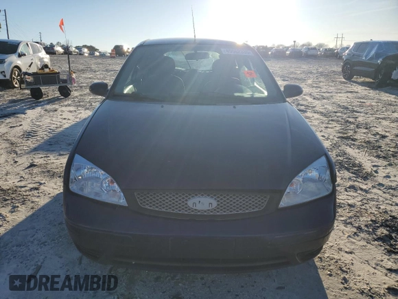 2007 Ford Focus S with VIN 1FAFP31N57W117622, listed as a Copart auction lot 45562335 with 232,209 mi miles and Salvage Title. Bid and sale history available at DreamBid. Image 5.