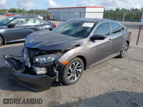 2017 Honda Civic EX z VIN 2HGFC2F75HH564169, wystawiony jako IAAI lot #41482206 z przebiegiem 93 363 mil mil oraz . Historia ofert i sprzedaży dostępna na DreamBid. Obrazek 18.