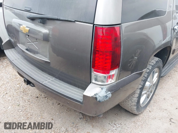2014 Chevrolet Tahoe LT with VIN 1GNSCBE08ER106419, listed as a IAAI auction lot 41789896 with 99,420 mi miles and . Bid and sale history available at DreamBid. Image 6.