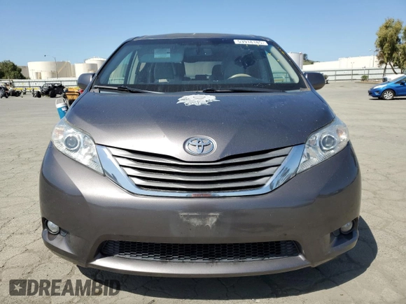 2011 Toyota Sienna XLE AAS with VIN 5TDYK3DC1BS117671, listed as a Copart auction lot 53918185 with 114,136 mi miles and Salvage Title. Bid and sale history available at carsss.com. Image 5.