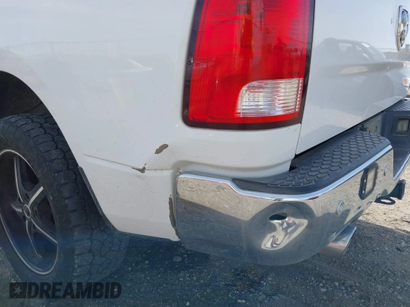 2015 Ram 1500 Big Horn with VIN 1C6RR6LM9FS676093, listed as a IAAI auction lot 41837207 with 132,685 mi miles and . Bid and sale history available at DreamBid. Image 12.