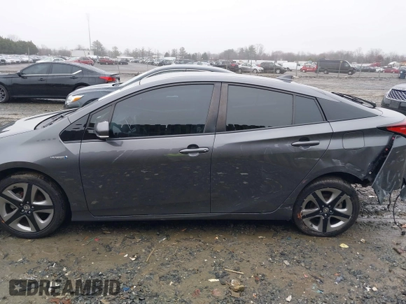 2019 Toyota Prius L Eco z VIN JTDKARFU8K3085918, wystawiony jako IAAI lot #41107891 z przebiegiem 166 295 mil mil oraz . Historia ofert i sprzedaży dostępna na DreamBid. Obrazek 14.