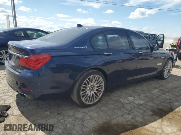 2012 BMW 7 Series with VIN WBAKX6C58CC197207, listed as a Copart auction lot 84153784 with 130,049 mi miles and Salvage title. Bid and sale history available at DreamBid. Image 3.