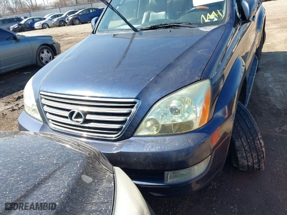 2003 Lexus GX 470 with VIN JTJBT20XX30016572, listed as a IAAI auction lot 41782620 with 127,024 mi miles. Bid and sale history available at carsss.com. Image 13.