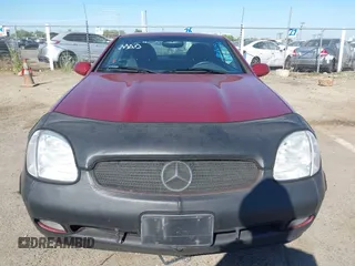 1999 Mercedes-Benz SLK 230/320 with VIN WDBKK47F5XF112125, listed as a IAAI auction lot 42207615 with 93,962 mi miles and . Bid and sale history available at DreamBid. Image 6.