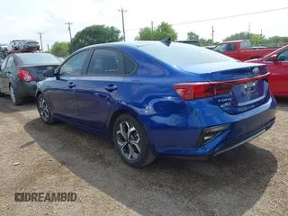 2021 Kia Forte LXS with VIN 3KPF24AD5ME384836, listed as a IAAI auction lot 42098713 with 29,107 mi miles and . Bid and sale history available at DreamBid. Image 3.