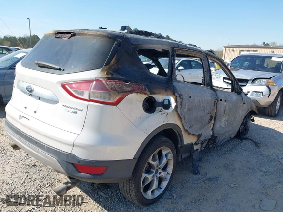 2015 Ford Escape Titanium с VIN 1FMCU9J90FUA48002, выставлен на аукционе IAAI как лот 41890275 с пробегом Не указан миль и . История ставок и продаж доступна на DreamBid. Изображение 4.