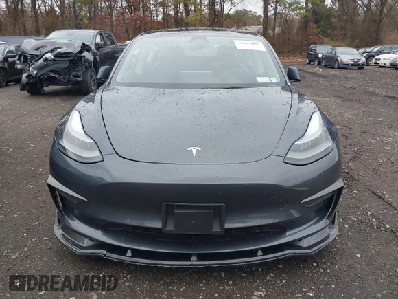 2022 Tesla Model 3 with VIN 5YJ3E1EA6NF143839, listed as a IAAI auction lot 40905007 with 83,897 mi miles and . Bid and sale history available at DreamBid. Image 11.