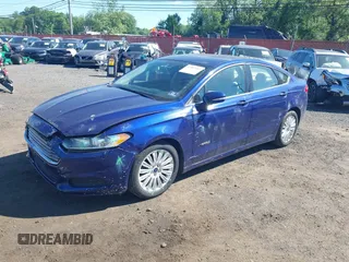2016 Ford Fusion SE Hybrid with VIN 3FA6P0LU9GR154646, listed as a IAAI auction lot 42307247 with 181,445 mi miles and . Bid and sale history available at DreamBid. Image 2.