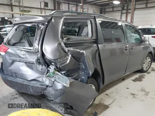 2013 Toyota Sienna XLE AAS with VIN 5TDYK3DC5DS355798, listed as a IAAI auction lot 41884055 with 135,032 mi miles. Bid and sale history available at carsss.com. Image 4.