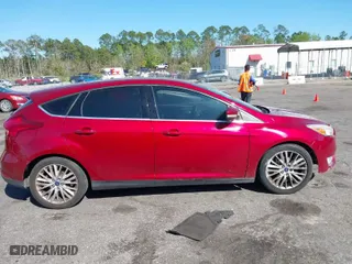 2015 Ford Focus Titanium with VIN 1FADP3N28FL215499, listed as a IAAI auction lot 41839092 with 152,102 mi miles. Bid and sale history available at carsss.com. Image 12.