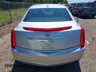 2014 Cadillac XTS Luxury z VIN 2G61M5S31E9199170, wystawiony jako IAAI lot #42150000 z przebiegiem 135 414 mil mil oraz . Historia ofert i sprzedaży dostępna na DreamBid. Obrazek 16.