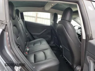 2018 Tesla Model 3 Long Range Battery z VIN 5YJ3E1EA7JF123805, wystawiony jako Copart lot #56034325 z przebiegiem 90 249 mil mil oraz Szkoda całkowita • Salvage title. Historia ofert i sprzedaży dostępna na DreamBid. Obrazek 10.