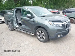 2018 Honda Ridgeline RTL-T with VIN 5FPYK3F61JB013733, listed as a IAAI auction lot 42548122 with 92,407 mi miles and . Bid and sale history available at DreamBid. Image 1.