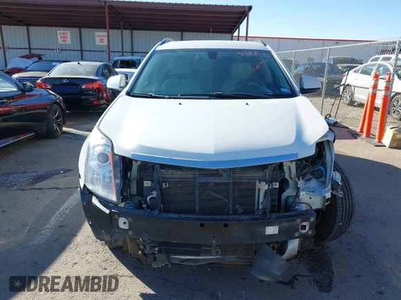 2015 Cadillac SRX with VIN 3GYFNAE34FS557297, listed as a IAAI auction lot 41388573 with 124,185 mi miles and . Bid and sale history available at DreamBid. Image 12.
